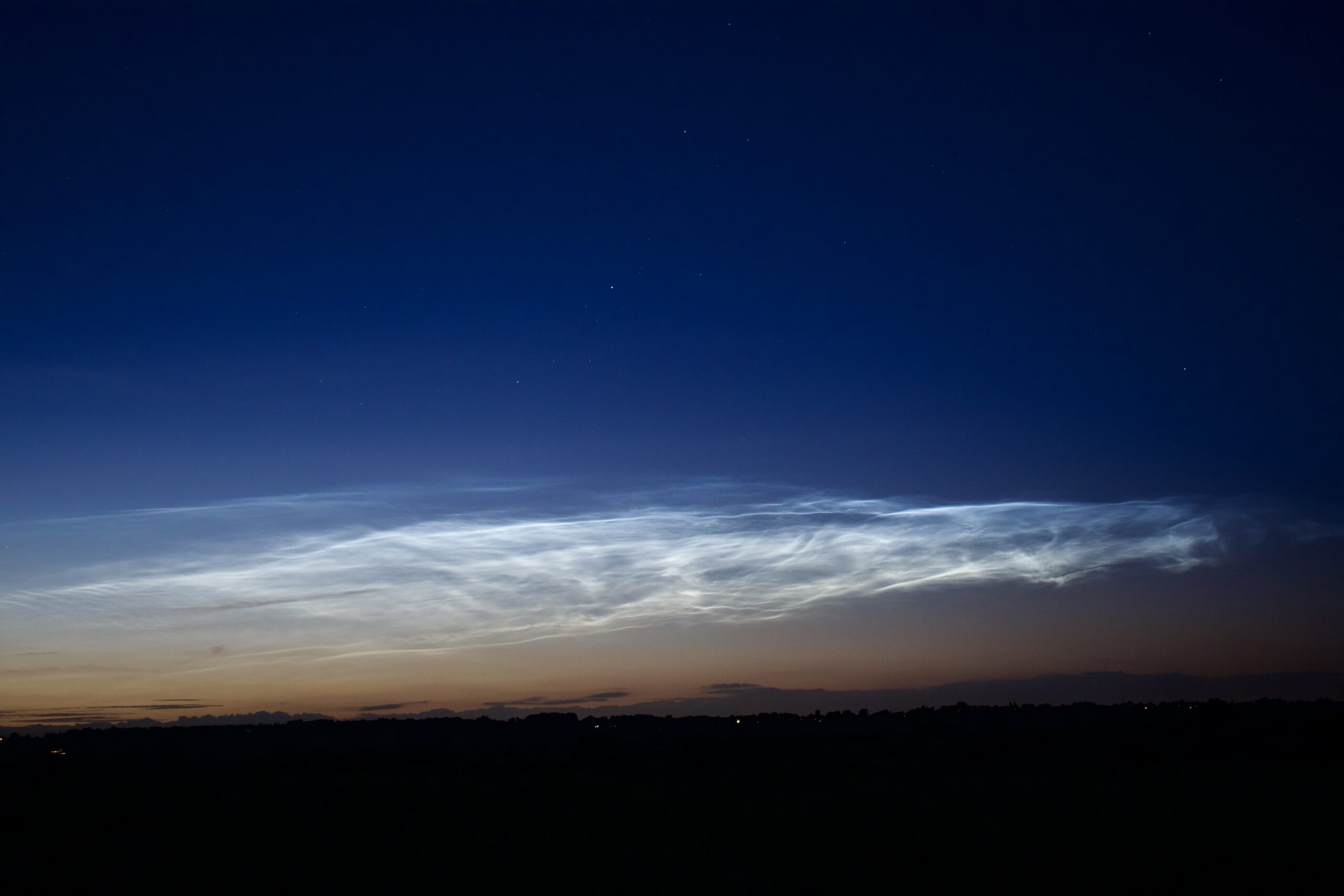 Electric blue noctilucent clouds seen over southern England in June 2024.
